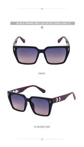 Detail einer eckigen Sonnenbrille mit roten Bügeln und blau-orangefarbenen Verlaufsgläsern