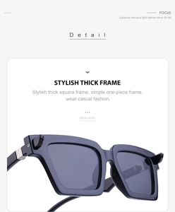 Close-up of thick square frames with silver metal hinges and anti-blue light lenses