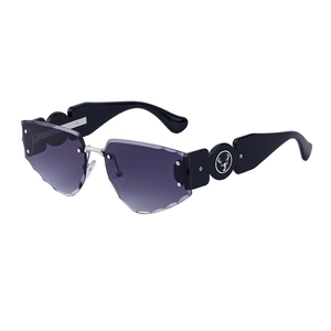 Frameless oversized sunglasses with purple gradient lenses and scalloped shell-cut edges