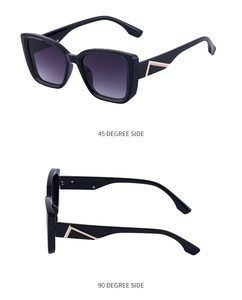 Vue détaillée des lunettes œil de chat avec verres dégradés violets et détails dorés