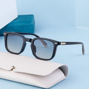 Retro square frame sunglasses with light blue gradient lenses and golden hardware