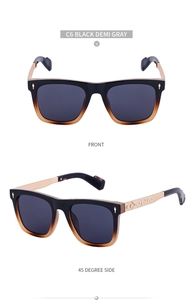 Detail view of square gradient sunglasses with gold metal temples and monogram engraving
