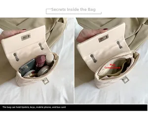 Internal view showing storage space for phone and makeup in quilted chain bag