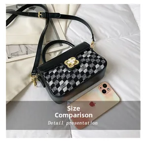 Size comparison of stylish tweed crossbody bag with golden petal lock and smartphone