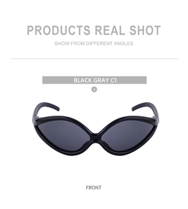 Frontal view of avant-garde Y2K cycling sunglasses with thick black wrap-around frames