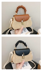 Detail view of straw woven bag featuring a ruffled handle and vintage metal twist lock