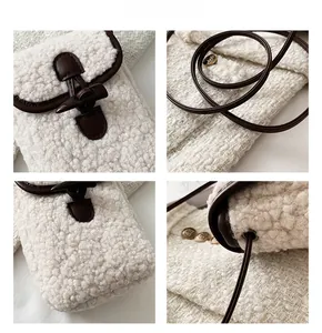 Detailed view of plush faux fur crossbody bag featuring vintage horn buckle closure