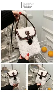Detailed view of white plush faux fur crossbody bag with leather strap and horn button
