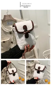 Detail of plush crossbody phone bag featuring white faux shearling and wooden toggle closure