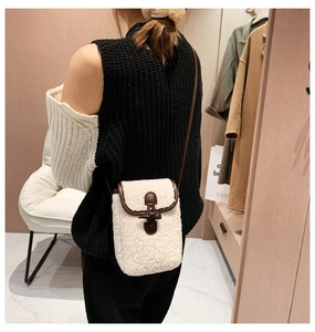 Faux shearling crossbody bag with vintage wooden horn button and leather strap
