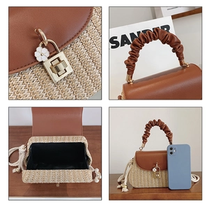Fashion straw woven crossbody bag with brown leather handle and floral pendant detail