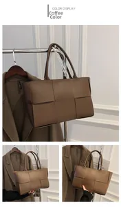 Close-up of the wide woven texture and brown leather material of this tote bag