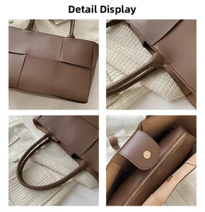 Detail of woven leather tote bag showing magnetic buckle and inner zipper pouch