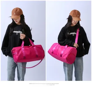 Deep pink multi-functional travel bag with waterproof nylon fabric and shoulder strap