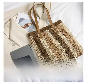 Detail view of woven striped tote bag showing interior capacity compared with iPad and phone