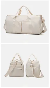 Detail view of large capacity travel bag featuring an independent shoe compartment