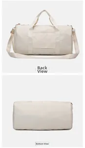 Detail view of large travel bag showing back luggage sleeve and flat base design