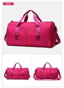 Detail view of large rose pink gym bag with reinforced handles and waterproof fabric