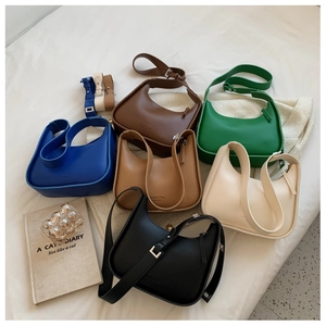 Collection of retro crescent armpit bags in multiple colors with textured PU leather finish