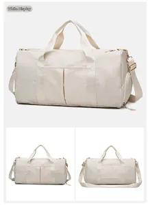 Detailed view of cream-white gym bag showing front and back with adjustable straps