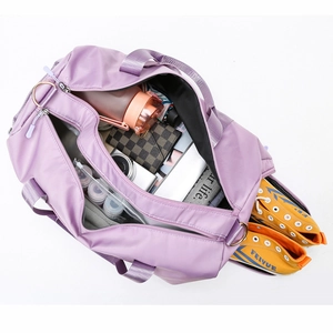 Large purple travel bag with separate shoe compartment and water-resistant nylon fabric
