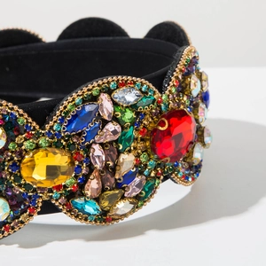 Detailed macro view of luxury baroque headband with multi-color rhinestones