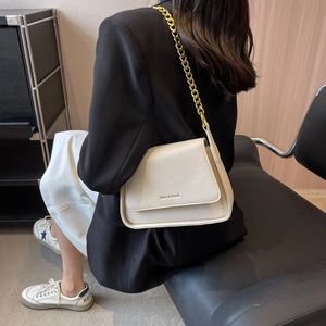 Elegant off-white PU leather crossbody bag with chunky gold chain strap for women