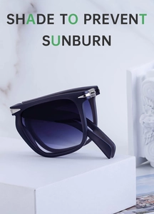Detail of folding polarized sunglasses with matte frame on a marble texture platform