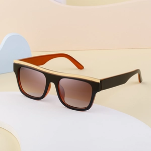 Fashion cat-eye sunglasses with flat top frame, gold metal trim and gradient lenses