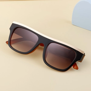 Flat top cat eye sunglasses with black frame, gradient brown lenses and amber temples
