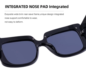 Détail des plaquettes de nez intégrées sur lunettes de soleil carrées noires à monture renforcée