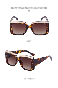 Détails de lunettes carrées écaillées avec verres dégradés marron et décor métal