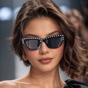 Fashionable black cat eye sunglasses with diamond rhinestones for a luxury women's style