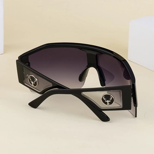Detail of Y2K cycling sunglasses with gradient purple lenses and deer metal hardware