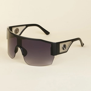 Detail of Y2K wraparound sunglasses featuring a silver stag emblem on the side temple
