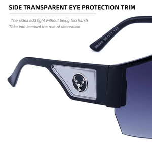 Detailed macro view of Y2K sunglasses hinge with silver deer head logo and matte black frame