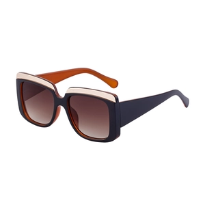 Lunettes de soleil carrées oversize avec verres dégradés et accent beige élégant