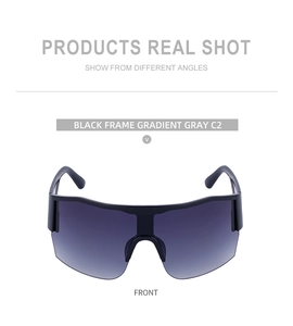 Front view detail of Y2K half-frame sunglasses with black frame and gradient gray lenses