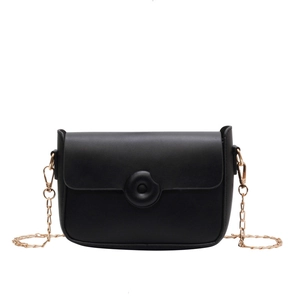 Classic black leather crossbody flap bag with gold chain strap and circular buckle