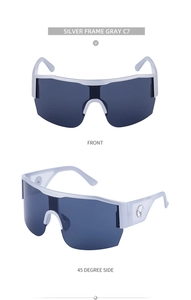 Detail view of Y2K cycling sunglasses featuring silver semi-rimless frames and deer logo