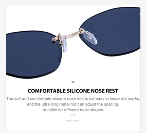 Detail of blue rimless sunglasses showing adjustable soft silicone nose pads and gold bridge