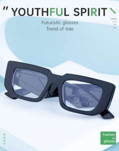 Detail of trendy thick black frame rectangular sunglasses with light blue lenses