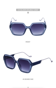 Détails des branches en métal argenté et verres dégradés de lunettes carrées bleues