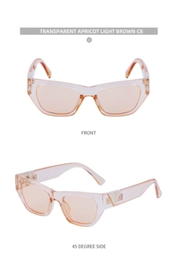 Detail view of transparent apricot cat-eye sunglasses with metal triangle accents