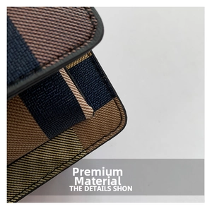 Macro shot of the luxury plaid crossbody bag with fine stitching and cross grain texture