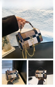 Detail view of brown patchwork plaid bag featuring a golden tassel and logo charm