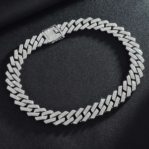 Silver Cuban link chain necklace with three rows of diamonds and iced out clasp