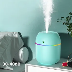 Mini USB clover humidifier with rainbow LED ring in mint green for bedroom use