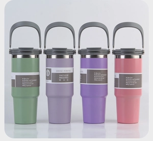 Row of 30oz insulated stainless steel tumblers in green, purple, and coral with handles