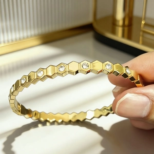 Minimalist 18K gold plated stainless steel honeycomb bangle with sparkling crystals